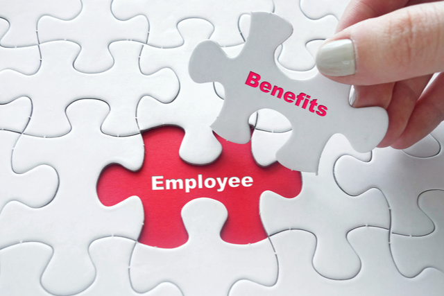 Puzzle with the word "Employee" and another piece that will complete it with the word "Benefits"