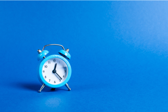 Limited Time Offer - Blue clock in solid blue background